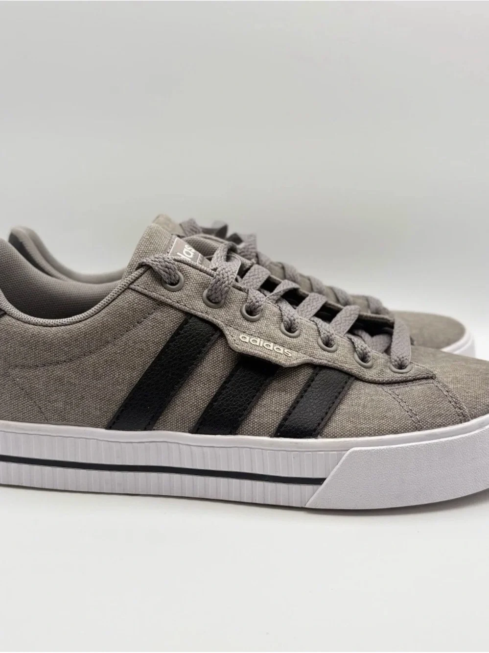 adidas Men’s Gray Canvas Sneakers with Black Stripes